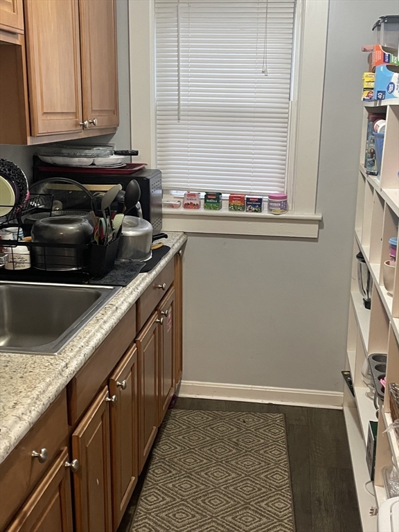 26 Sylvan Street Worcester, MA 01603 - Photo 13 of 28 a kitchen with a sink and cabinets