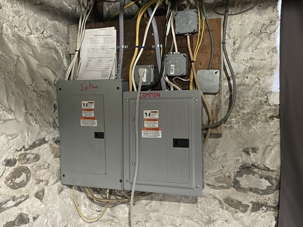 26 Sylvan Street Worcester, MA 01603 - Photo 22 of 28 a view of water heater room