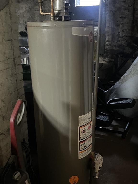 26 Sylvan Street Worcester, MA 01603 - Photo 25 of 28 a close view of water heater