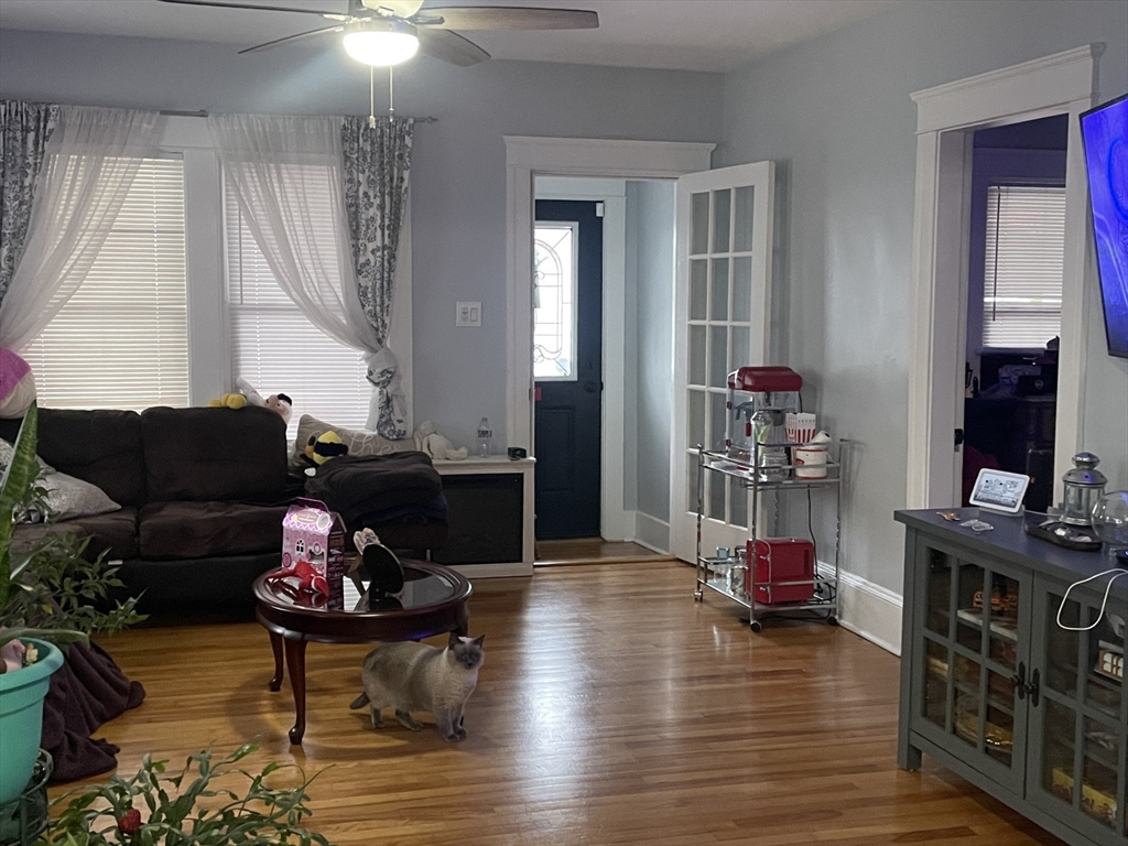 26 Sylvan Street Worcester, MA 01603 - Photo 6 of 28 a living room with furniture and wooden floor