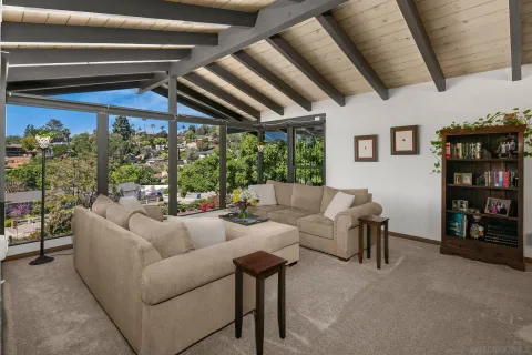 a kitchen with stainless steel appliances granite countertop a stove top oven a sink dishwasher and a refrigerator