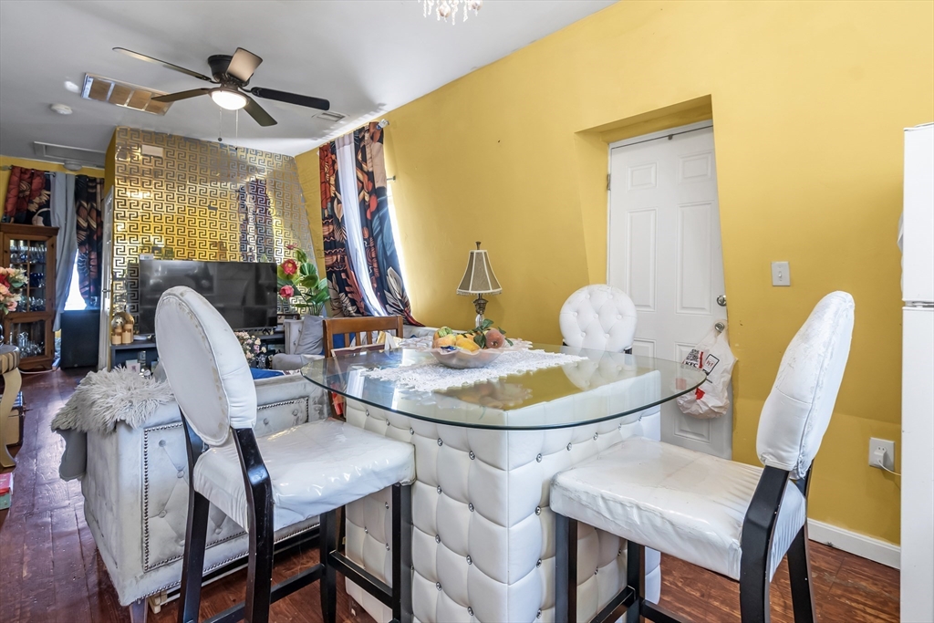 191 Farnham Street Lawrence, MA 01843 - Photo 21 of 31 a dining room with furniture and window
