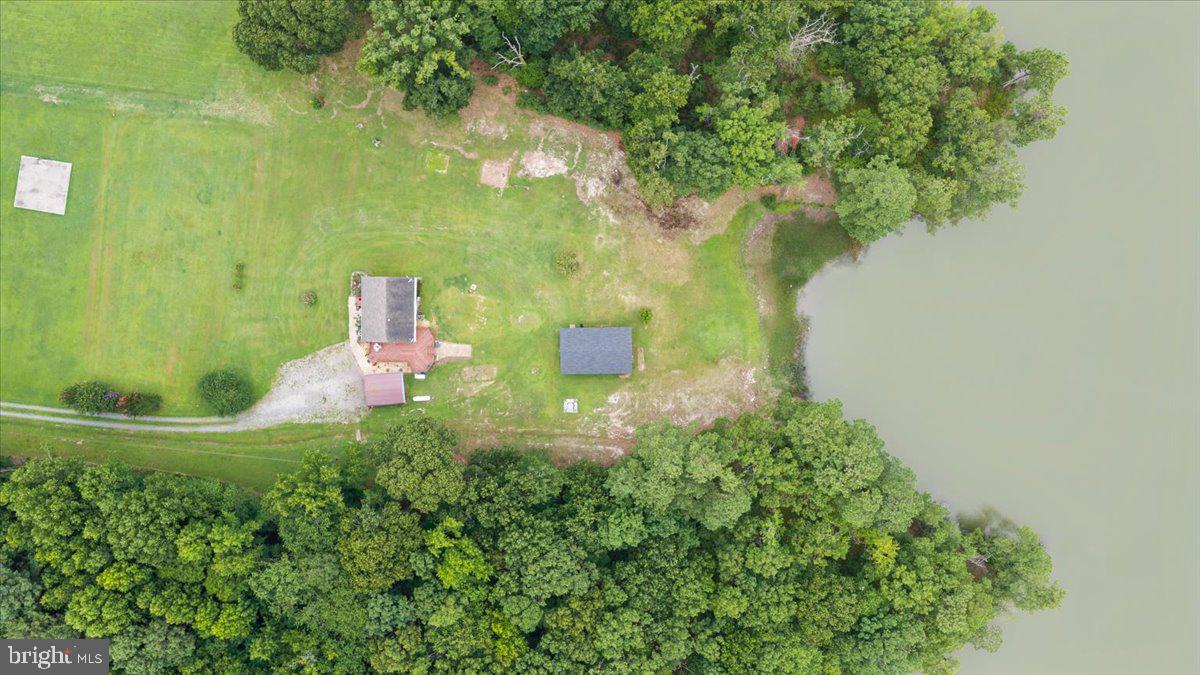 141 Raintree Lane Reedville, VA 22539 - Photo 14 of 86 Lush retreat by the tranquil water.