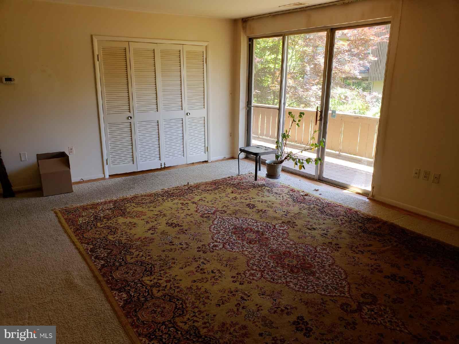 11 Hamill Road, Unit 11D Baltimore, MD 21210 - Photo 5 of 16 a view of an empty room and window