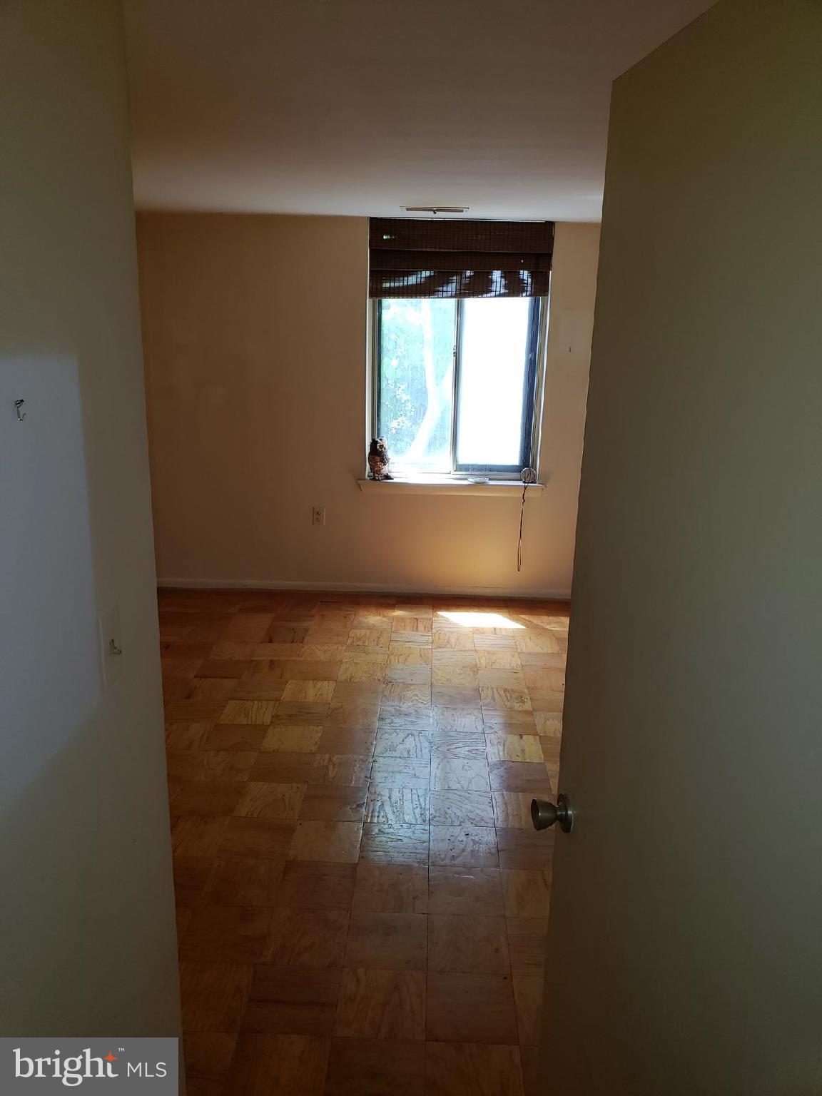 11 Hamill Road, Unit 11D Baltimore, MD 21210 - Photo 6 of 16 a view of hallway with window