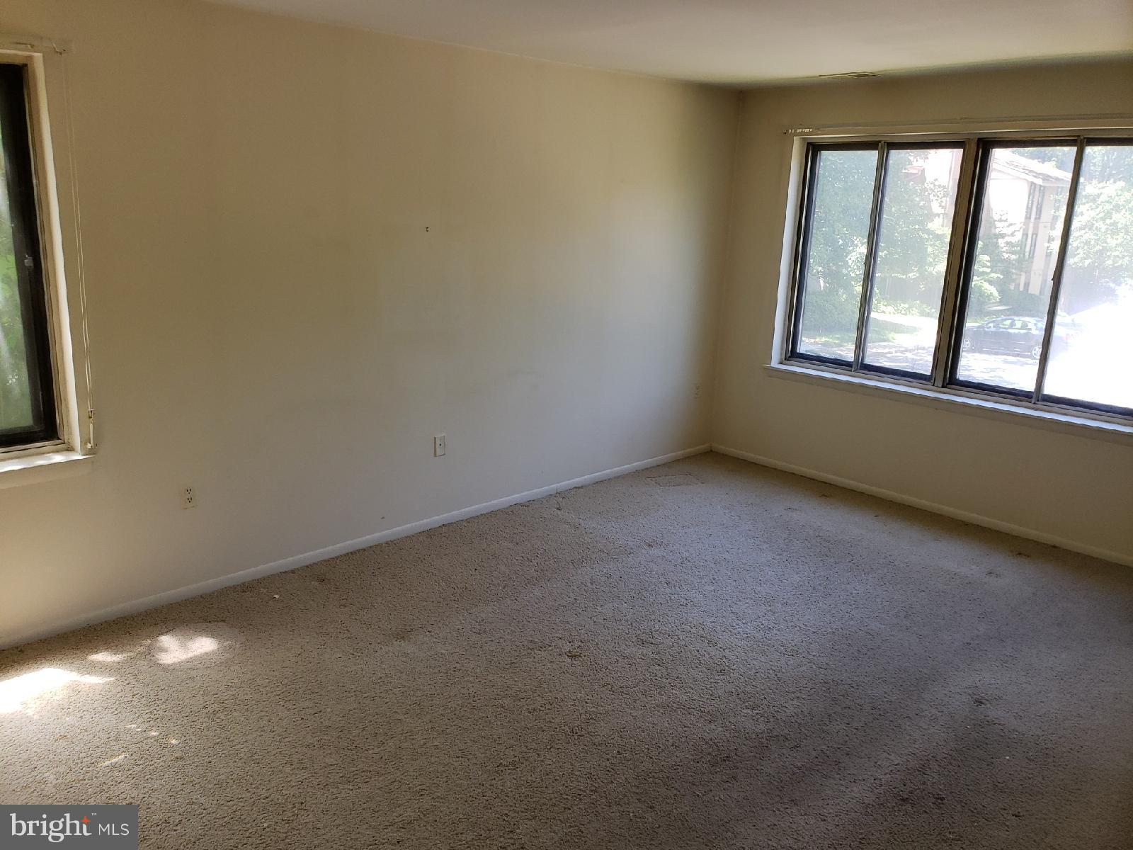 11 Hamill Road, Unit 11D Baltimore, MD 21210 - Photo 8 of 16 an empty room with a window