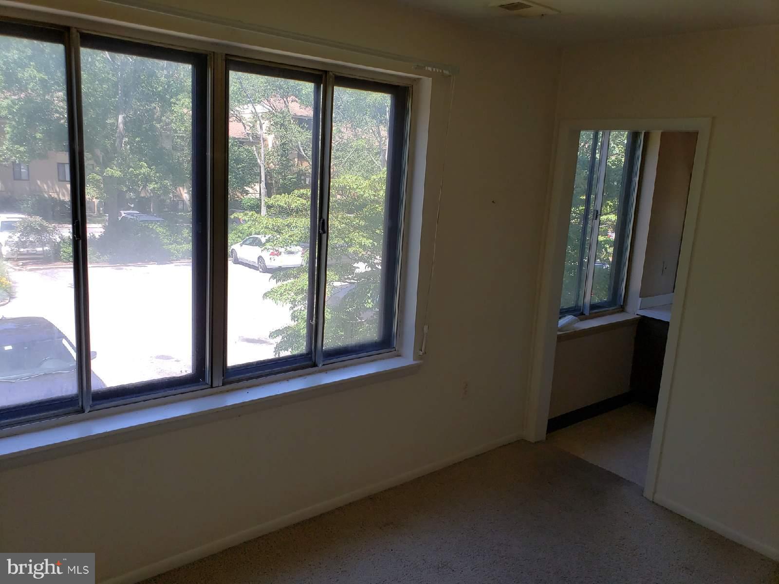 11 Hamill Road, Unit 11D Baltimore, MD 21210 - Photo 9 of 16 a view of a room that has a window in it