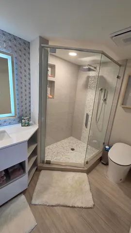a bathroom with a sink and a mirror