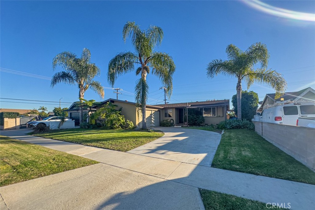 7460 Bock Avenue Stanton, CA 90680 - Photo 2 of 3 a view of a backyard