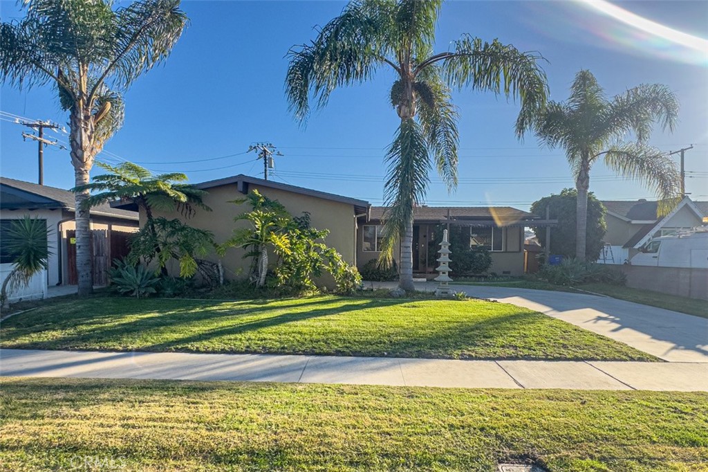 7460 Bock Avenue Stanton, CA 90680 - Photo 3 of 3 a view of a house with a yard