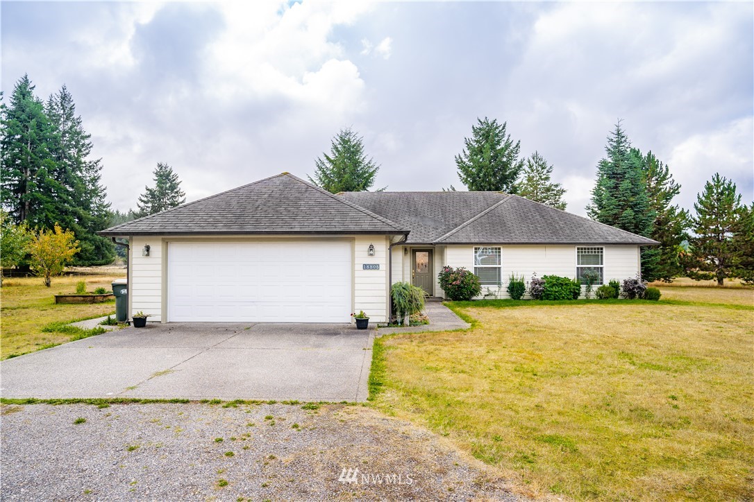 18806 Sams Place Southwest Rochester, WA 98579 - Photo 1 of 40 a house with swimming pool in front of it