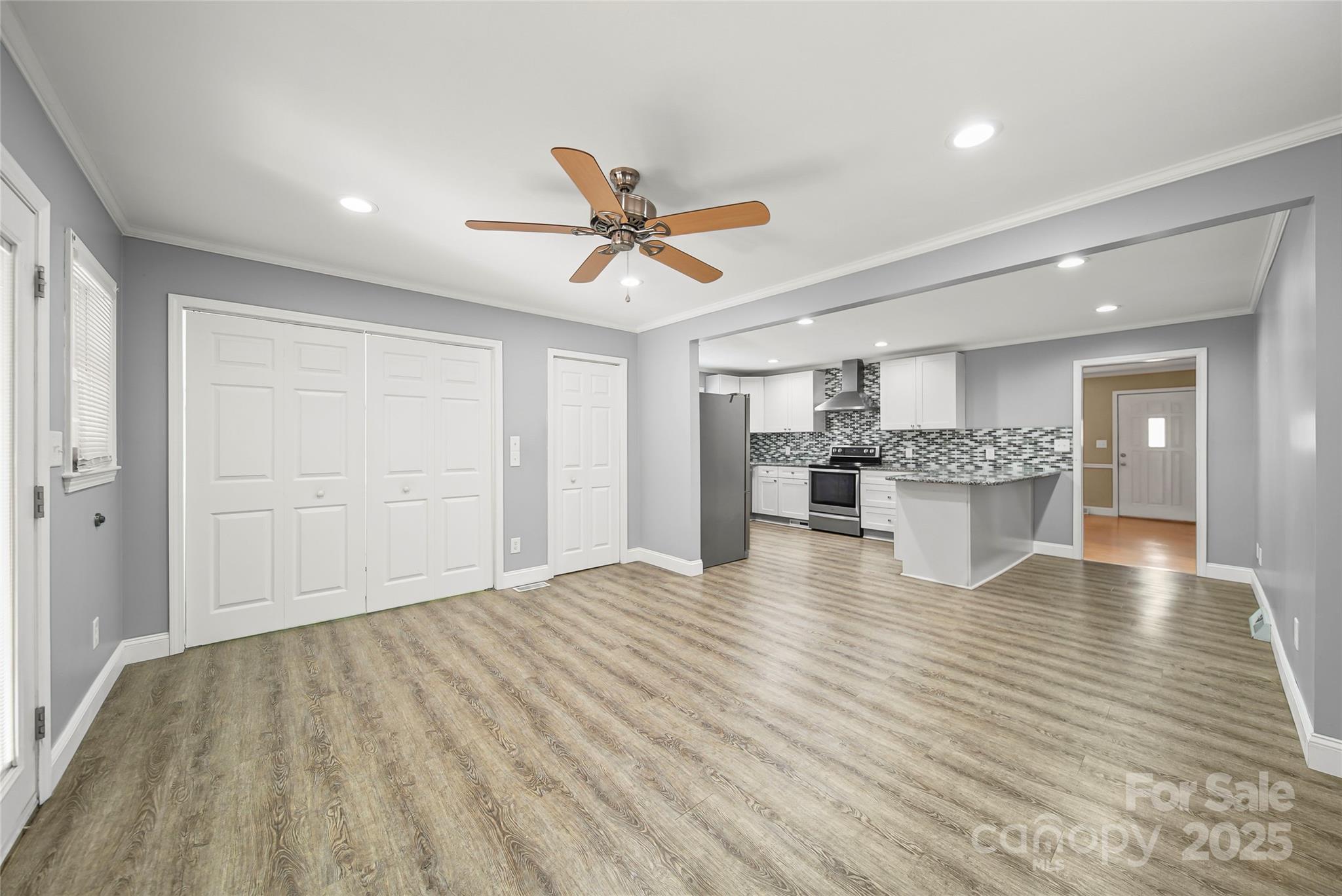 125 Lowder Road Albemarle, NC 28001 - Photo 11 of 37 a view of a kitchen with a sink and cabinet