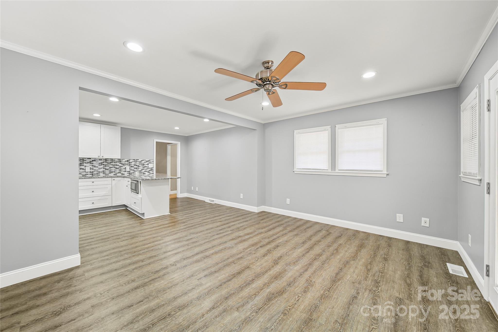 125 Lowder Road Albemarle, NC 28001 - Photo 12 of 37 a view of an empty room with a window