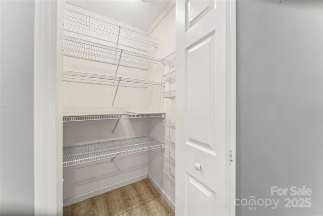 a empty closet with white paint
