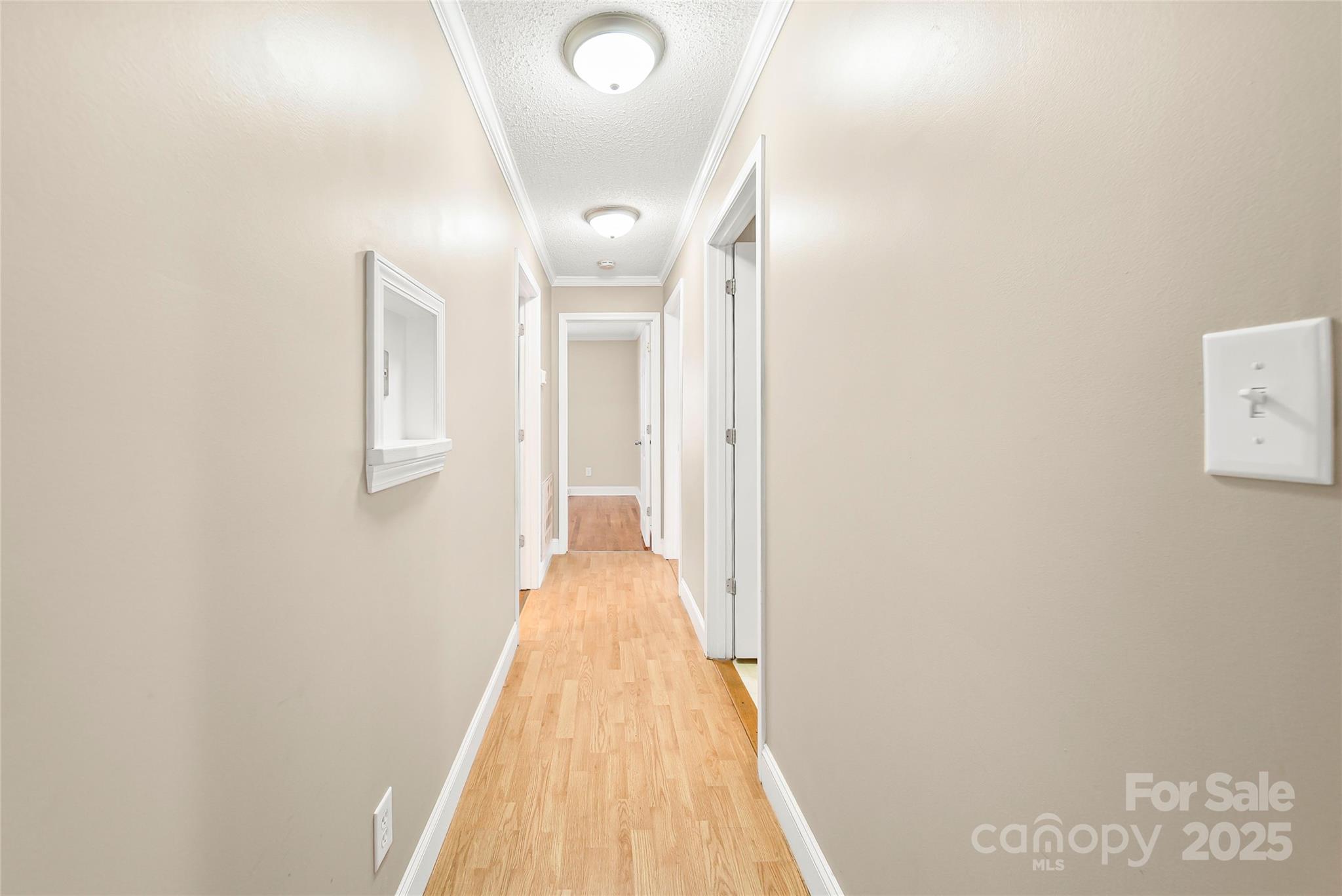 125 Lowder Road Albemarle, NC 28001 - Photo 17 of 37 a view of a hallway with wooden floor