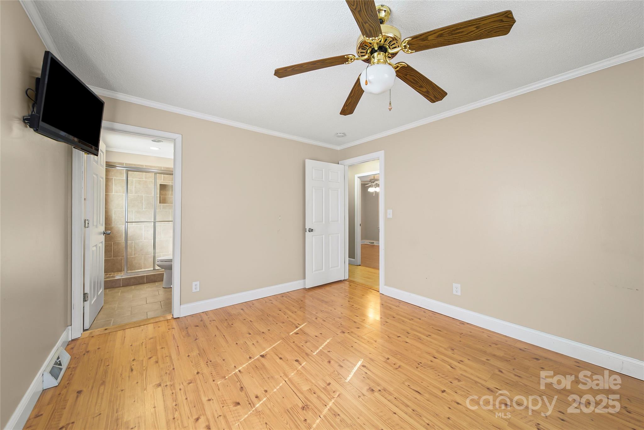 125 Lowder Road Albemarle, NC 28001 - Photo 24 of 37 an empty room with fan and a ceiling fan