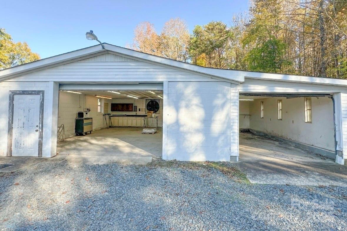 125 Lowder Road Albemarle, NC 28001 - Photo 25 of 37 a view of a house with a space and garage