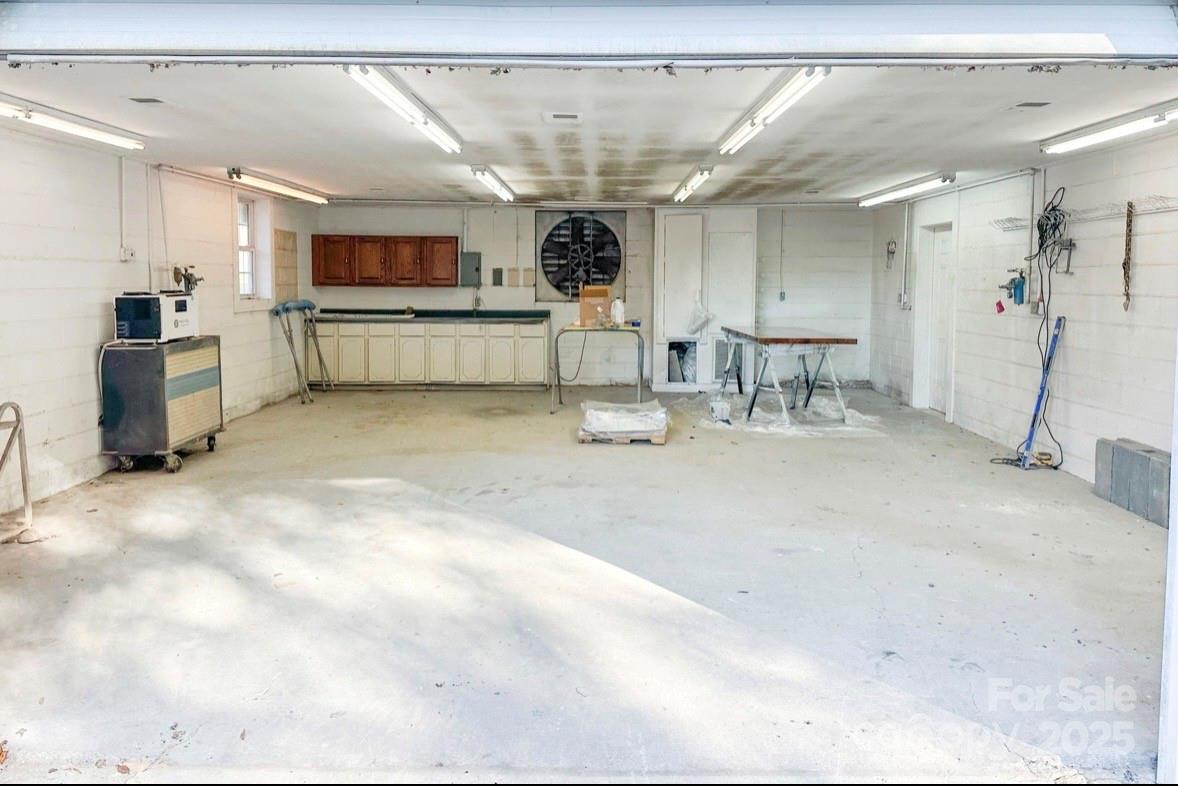 125 Lowder Road Albemarle, NC 28001 - Photo 26 of 37 a room with lots of furniture and view of kitchen