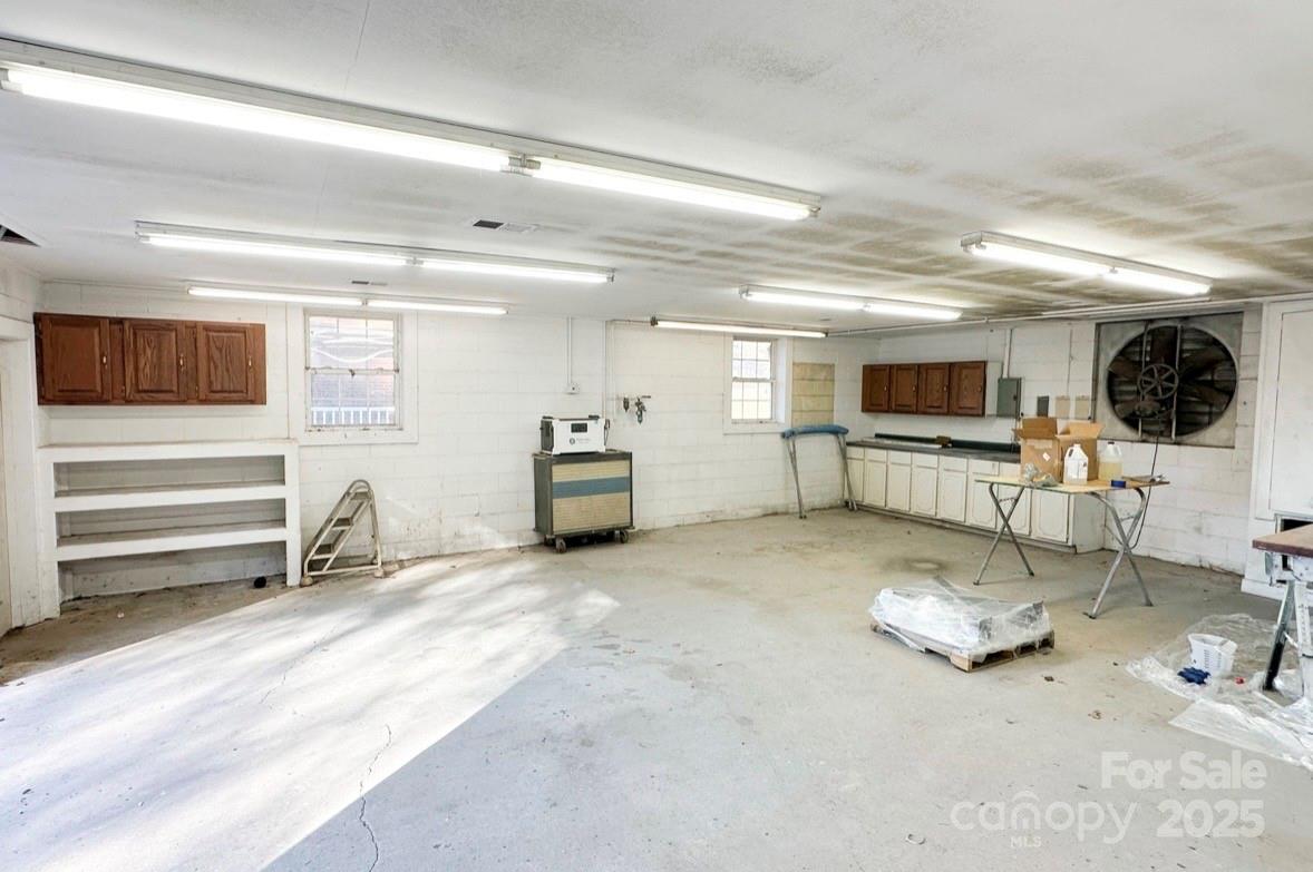 125 Lowder Road Albemarle, NC 28001 - Photo 29 of 37 a view of a livingroom with furniture and a flat screen tv