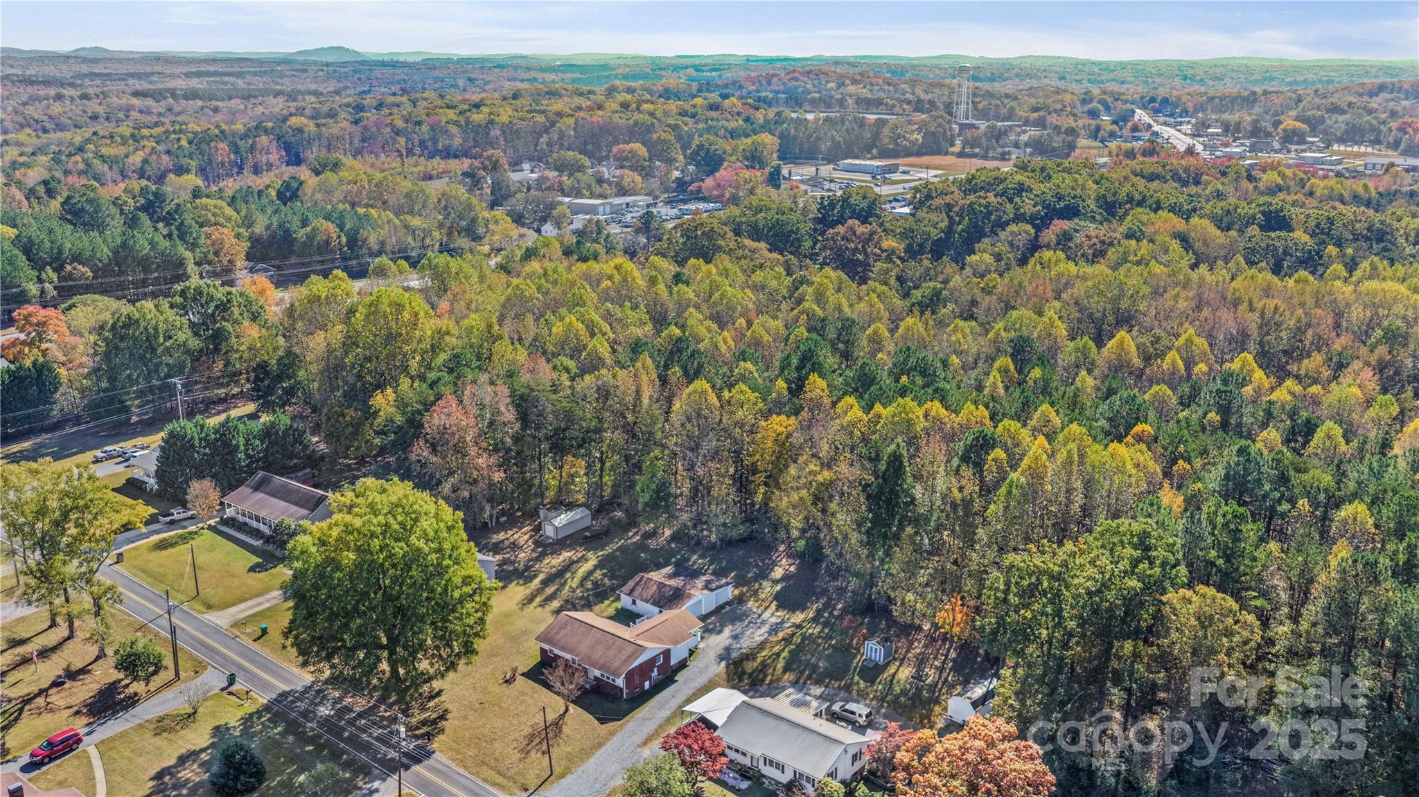 125 Lowder Road Albemarle, NC 28001 - Photo 32 of 37 an aerial view of a city with lots of residential buildings