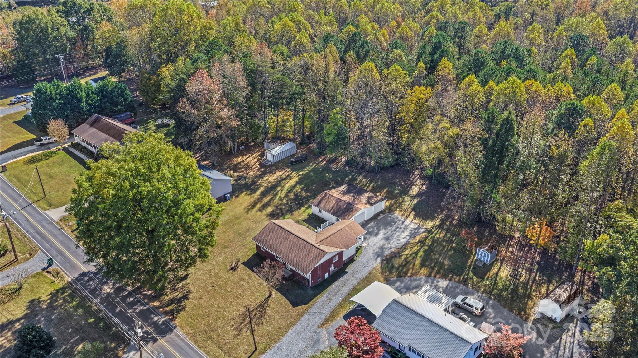 125 Lowder Road Albemarle, NC 28001 - Photo 34 of 37 an aerial view of a house with a yard