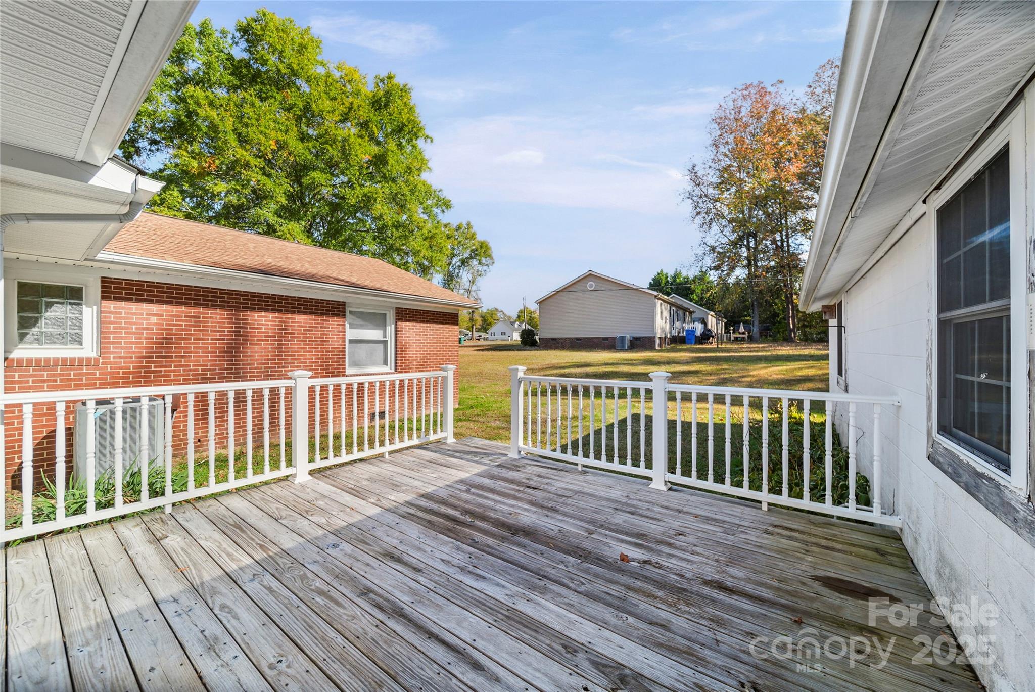 125 Lowder Road Albemarle, NC 28001 - Photo 5 of 37 a view of a wooden roof deck