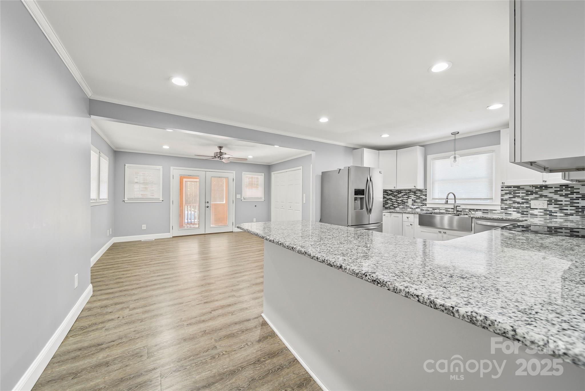 125 Lowder Road Albemarle, NC 28001 - Photo 10 of 37 a view of a kitchen with a sink and cabinets