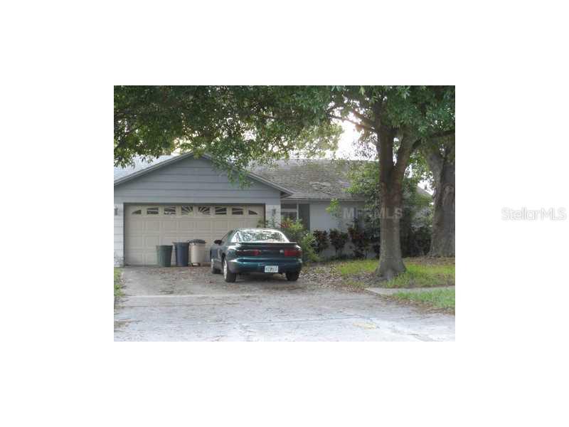 a car parked in front of a house