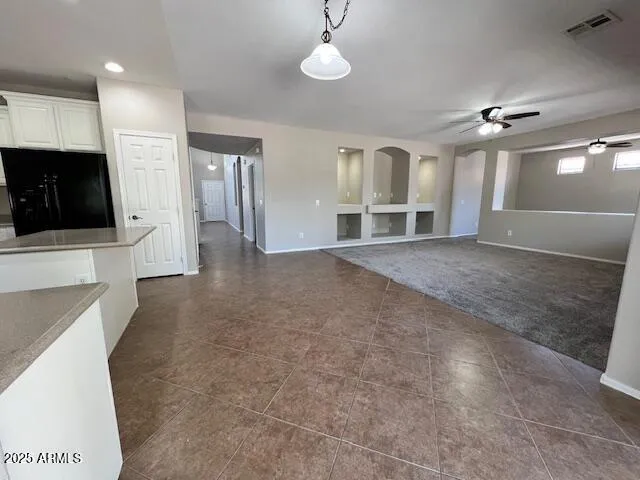 a view of a livingroom with a flat screen tv