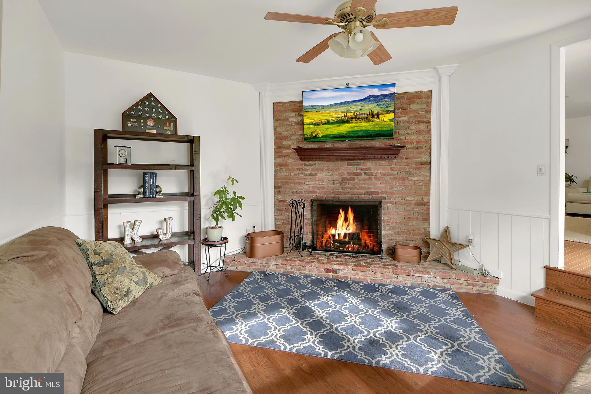 1989 Valley Road Annapolis, MD 21401 - Photo 6 of 42 BRICK WOOD BURNING FIREPLACE IN DEN
