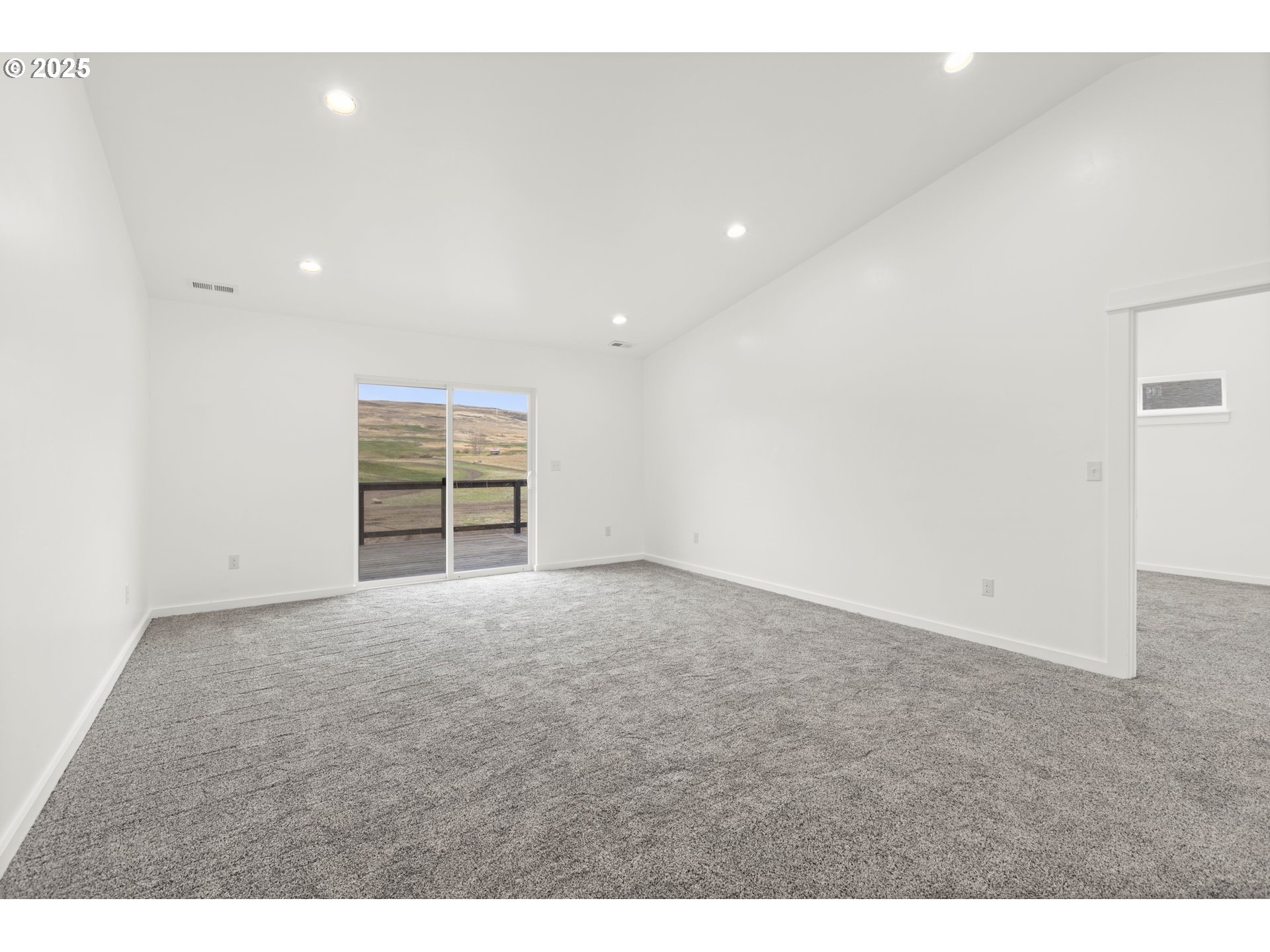 240 Heritage Lane Union, OR 97883 - Photo 25 of 36 a view of an empty room with wooden floor