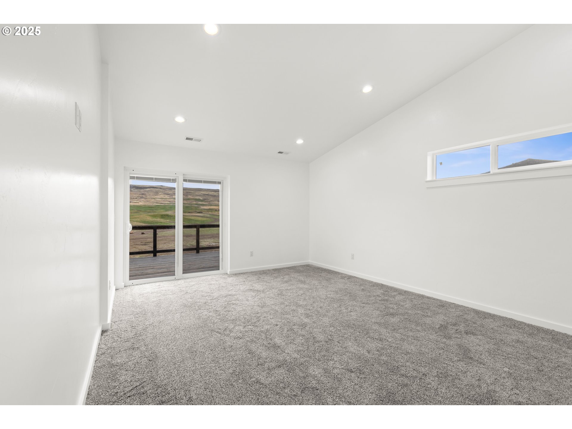 240 Heritage Lane Union, OR 97883 - Photo 30 of 36 a view of an empty room with wooden floor and windows
