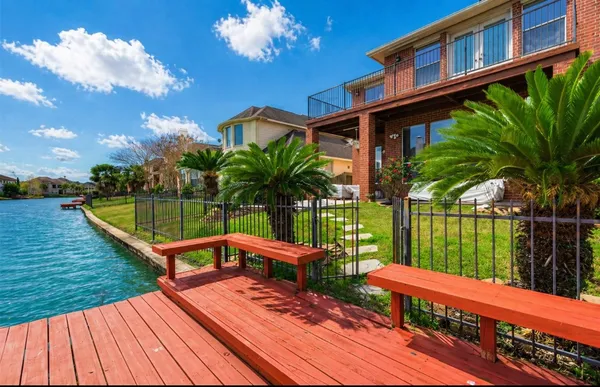 a view of swimming pool with a patio