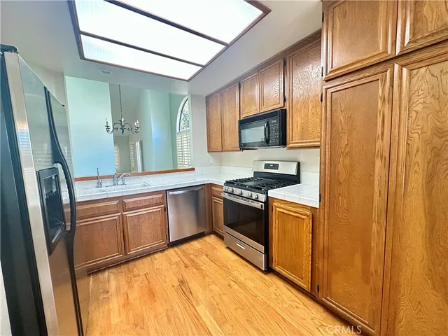a view of a big room with closet and windows