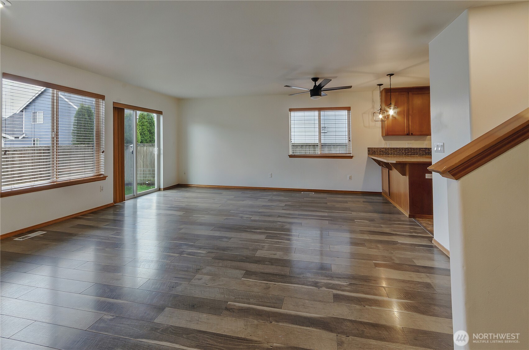 9114 Canal Road Southeast Yelm, WA 98597 - Photo 15 of 40 wooden floor in an empty room with a window