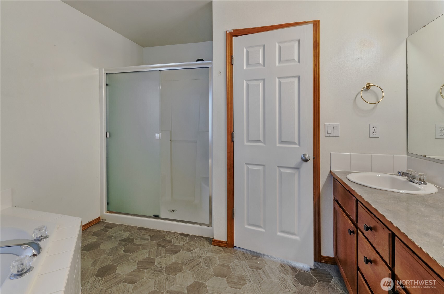 9114 Canal Road Southeast Yelm, WA 98597 - Photo 20 of 40 a bathroom with a sink and a mirror