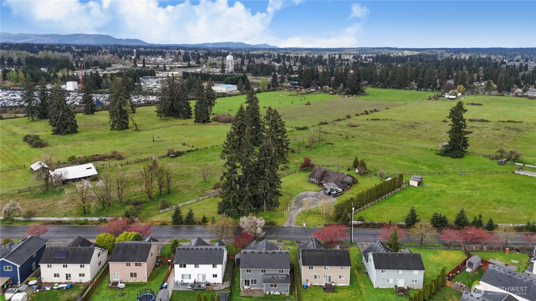 9114 Canal Road Southeast Yelm, WA 98597 - Photo 2 of 40 an aerial view of a houses with outdoor space
