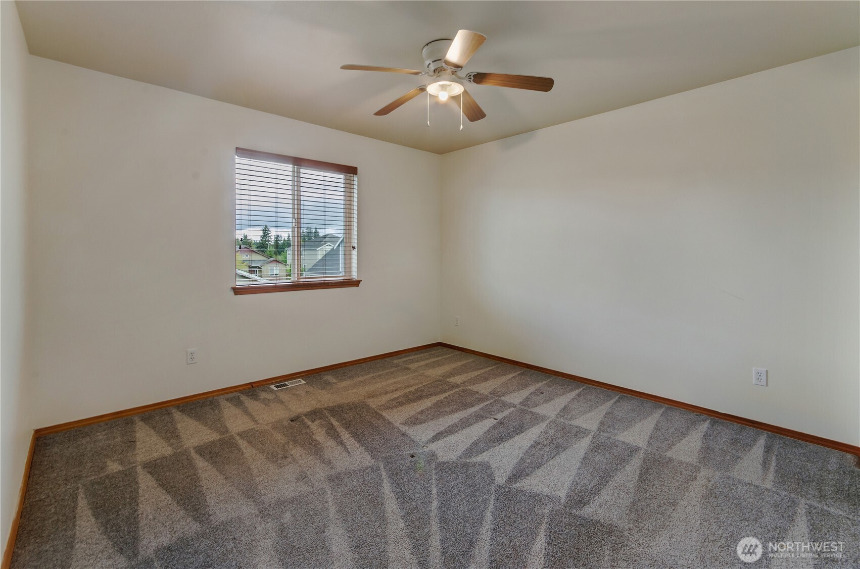 9114 Canal Road Southeast Yelm, WA 98597 - Photo 23 of 40 a view of an empty room with a window