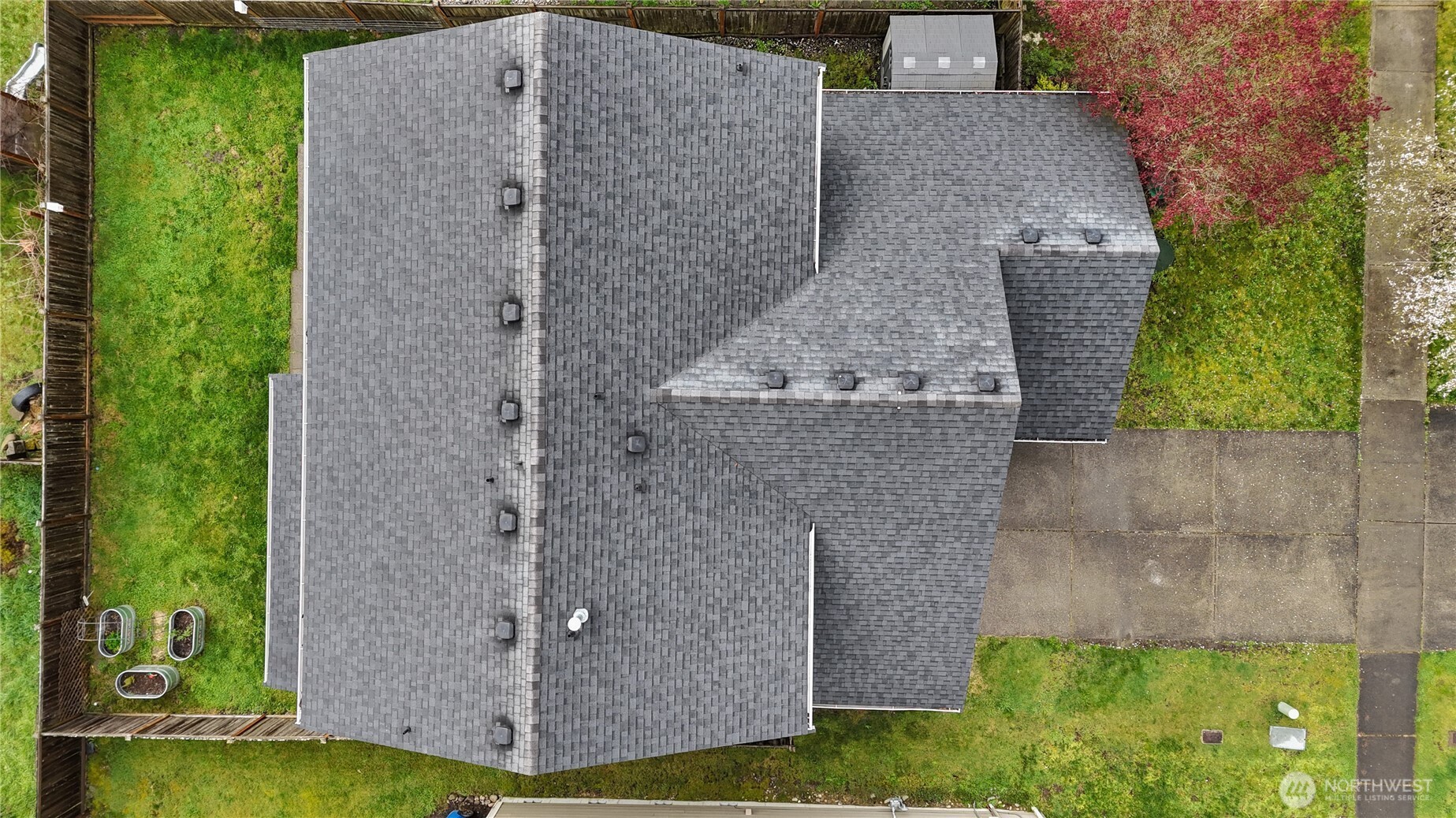 9114 Canal Road Southeast Yelm, WA 98597 - Photo 38 of 40 an aerial view of a house with a yard and large tree