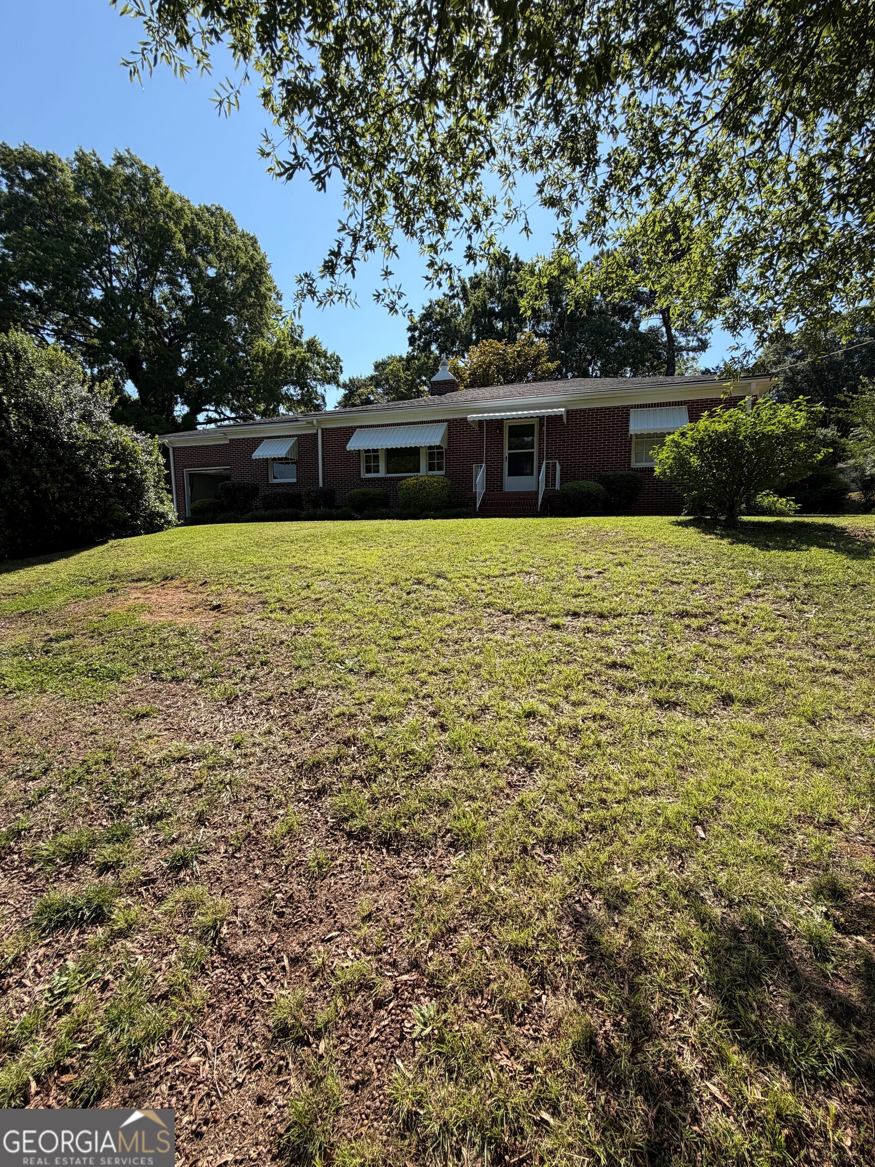 2619 Maple Road Southeast Rome, GA 30161 - Photo 21 of 31 a large yard with lots of trees