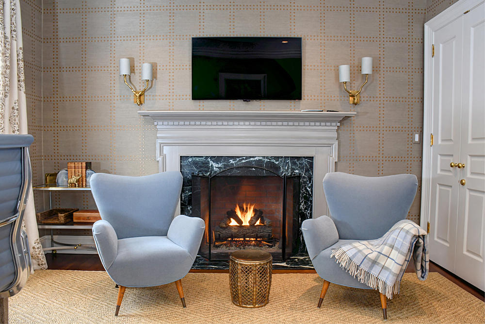 507 Silvermine Road New Canaan, CT 06840 - Photo 27 of 40 a living room with furniture and a fireplace