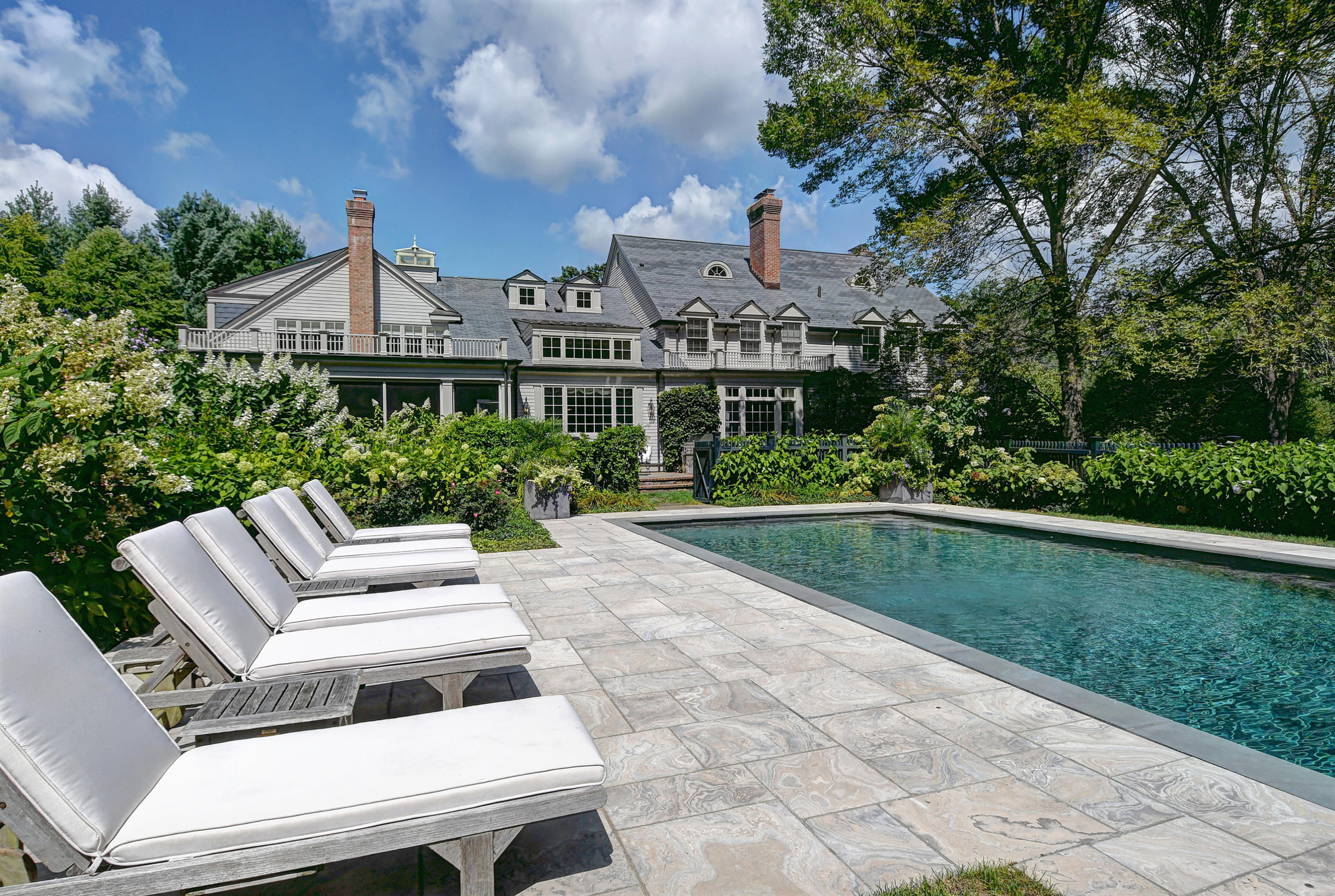 507 Silvermine Road New Canaan, CT 06840 - Photo 3 of 40 a view of a house with a yard
