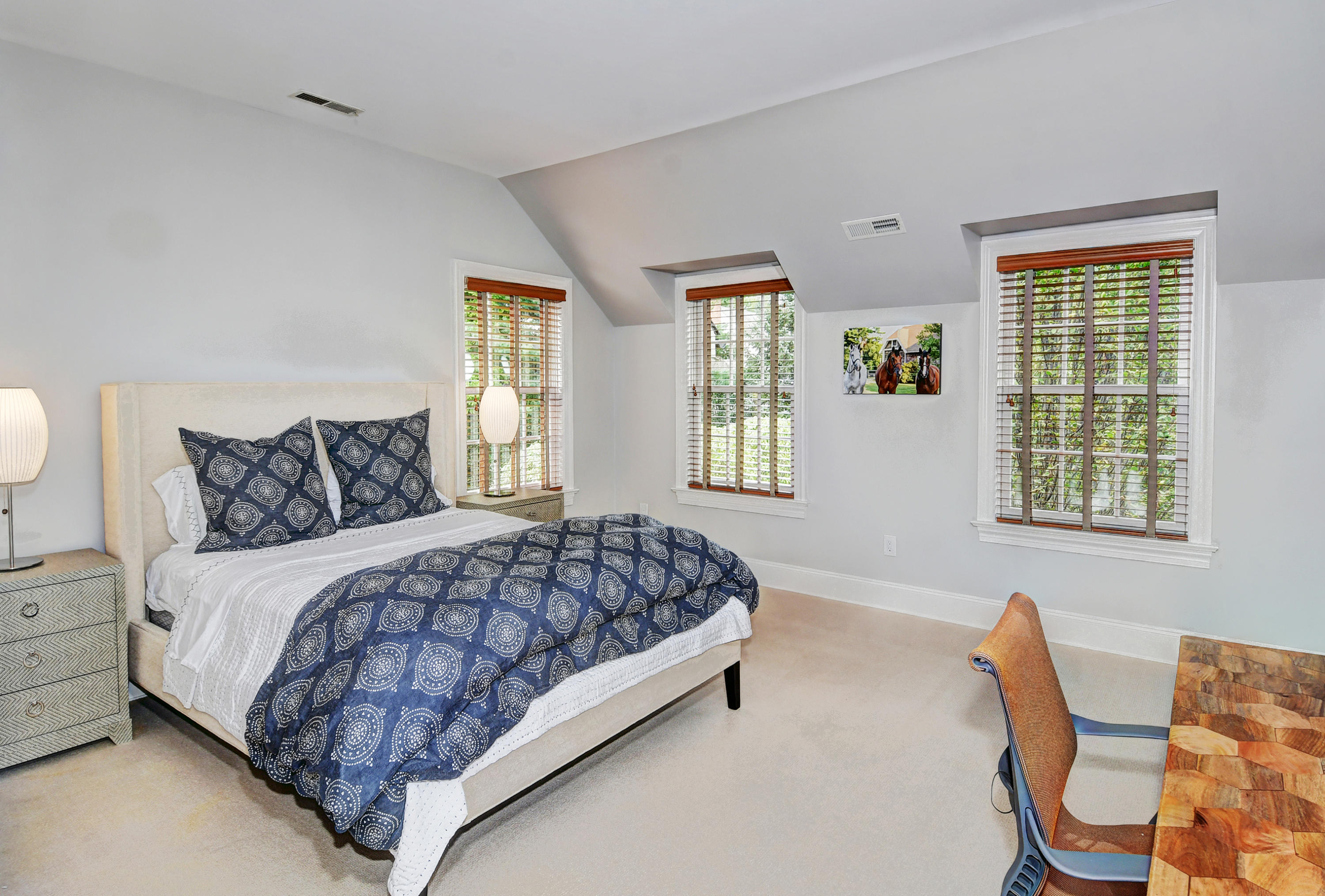 507 Silvermine Road New Canaan, CT 06840 - Photo 31 of 40 a bedroom with a bed chair and window
