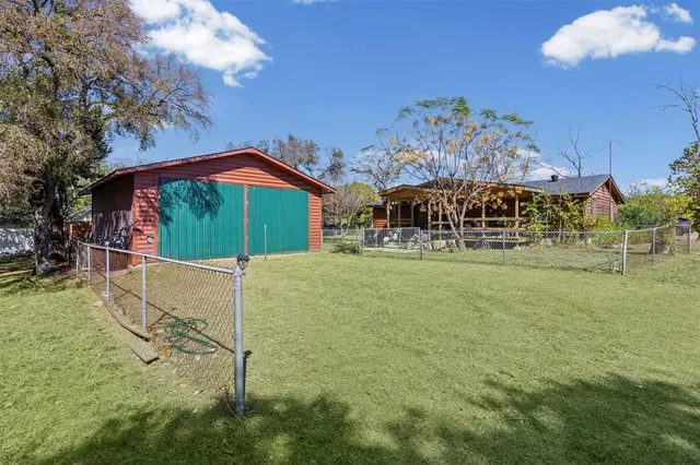 a house view with garden space