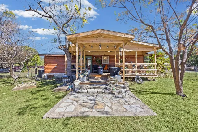 a view of a chairs and tables in the patio