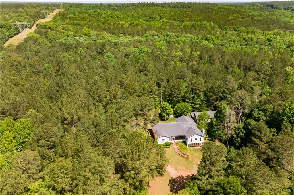 445 Unionville Road Barnesville, GA 30204 - Photo 1 of 1 a view of a lake view with a tree