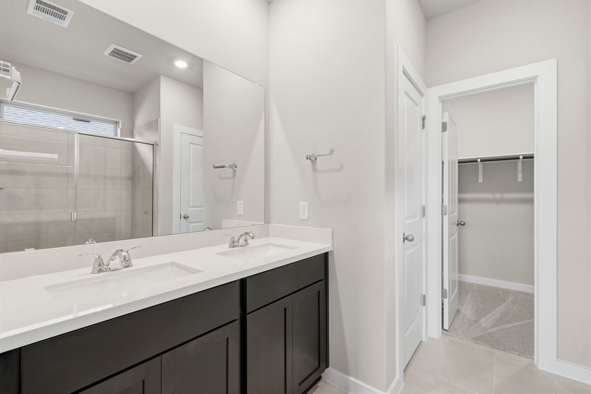 13508 Gray Landing Drive Elgin, TX 78621 - Photo 17 of 33 Primary Bath retreat with dual vanities