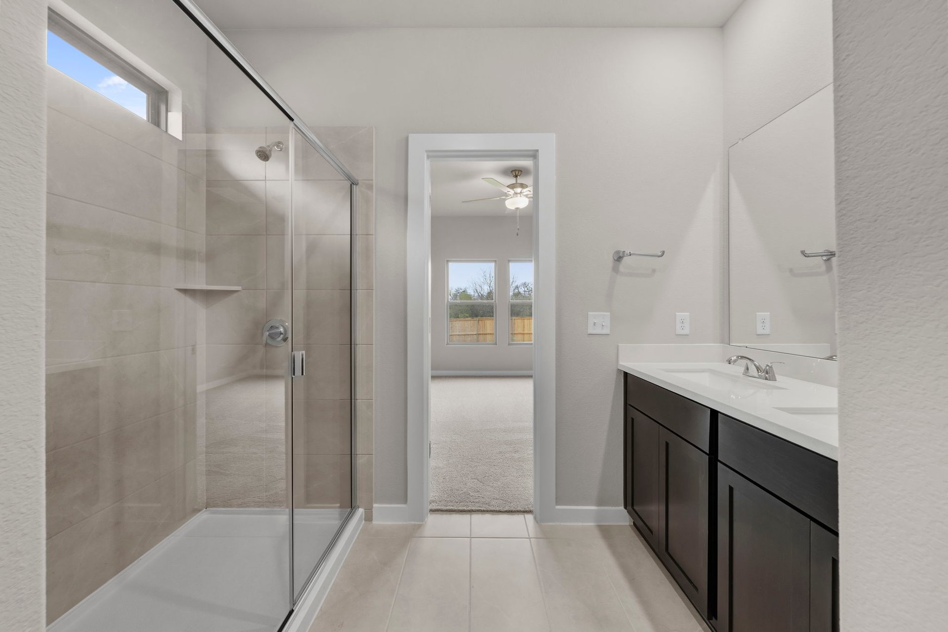 13508 Gray Landing Drive Elgin, TX 78621 - Photo 18 of 33 Primary Bath retreat with dual vanities & walk-in shower
