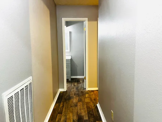 a blue house with a outdoor space