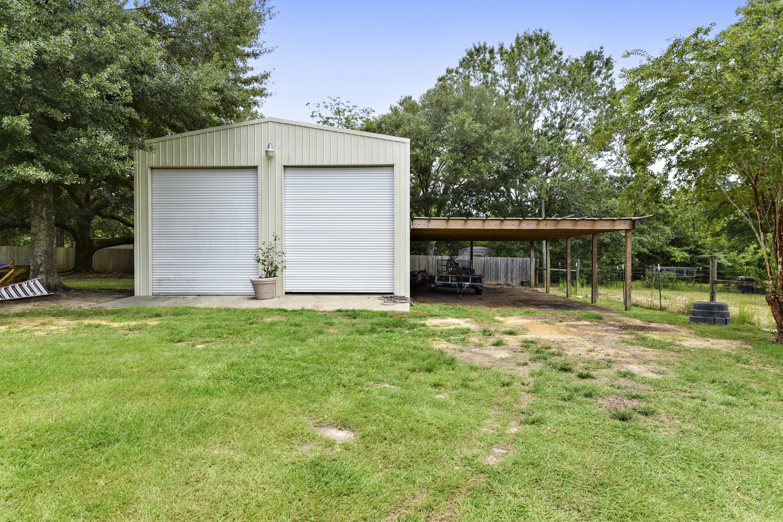24025 Placide Road Pass Christian, MS 39571 - Photo 28 of 40 027